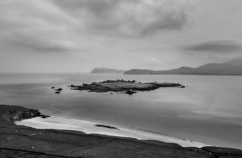 A black and white image of the Dingle coastline from the Great Blasket Island.