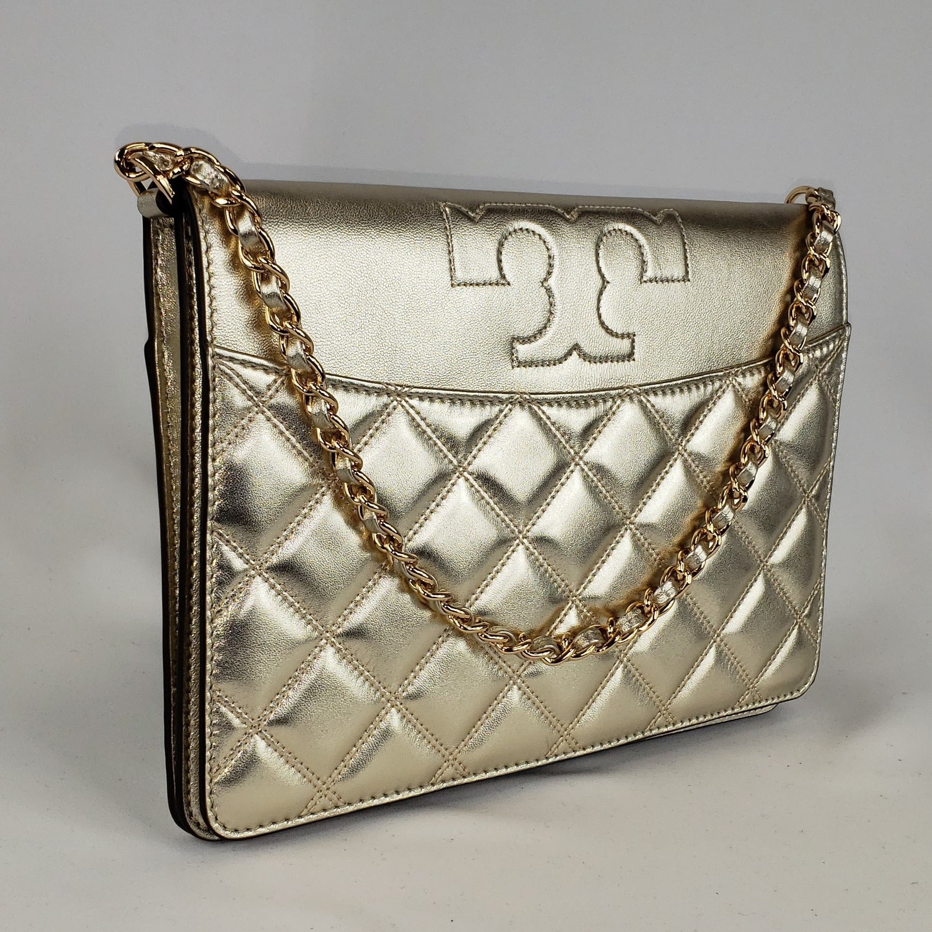 tory burch gold clutch