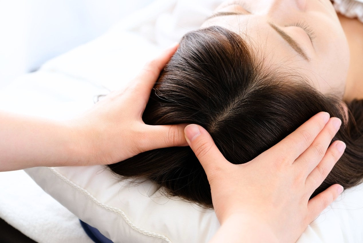 woman doing scalp massage