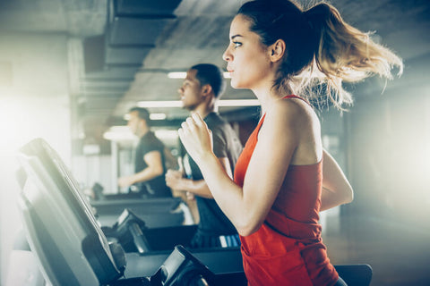 A woman running on the treadmill a great exercise during the follicular phase