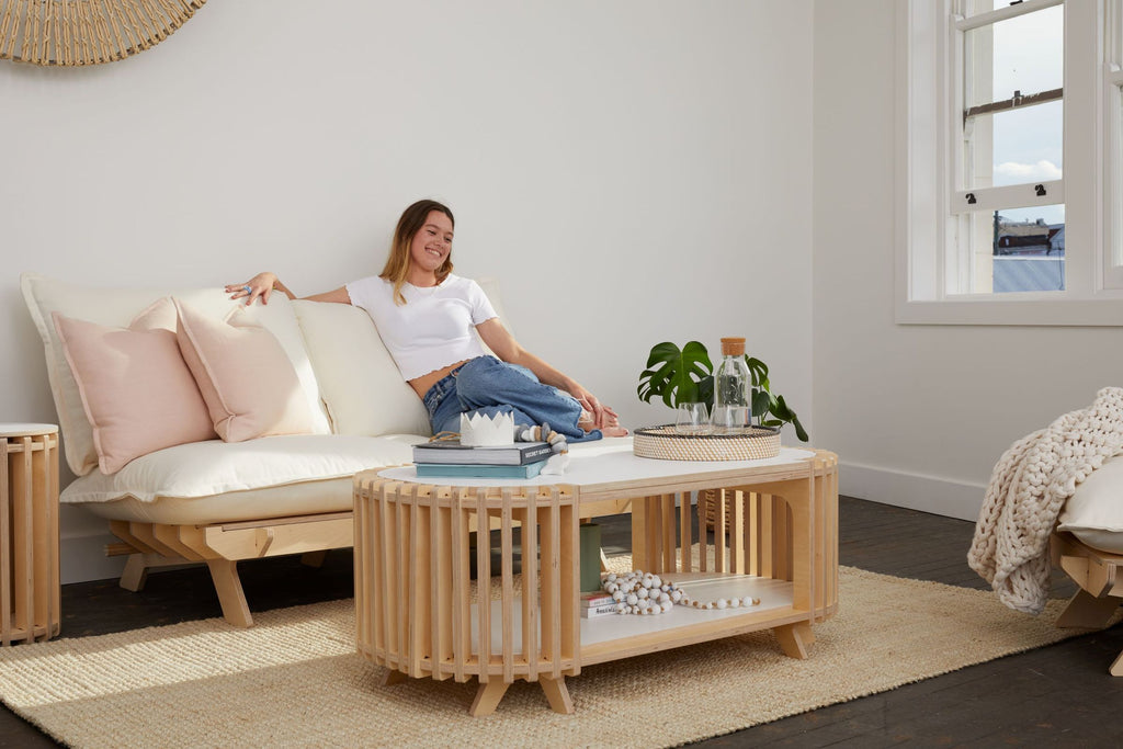 girl relaxing on new sofa