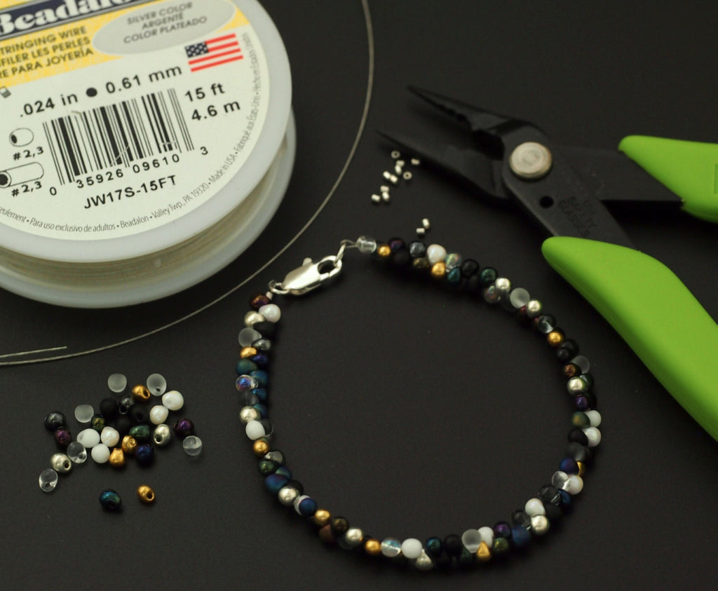 Best Stretch Cord for Bead Bracelets - Opelon 0.7mm White or Black –  Creating Unkamen
