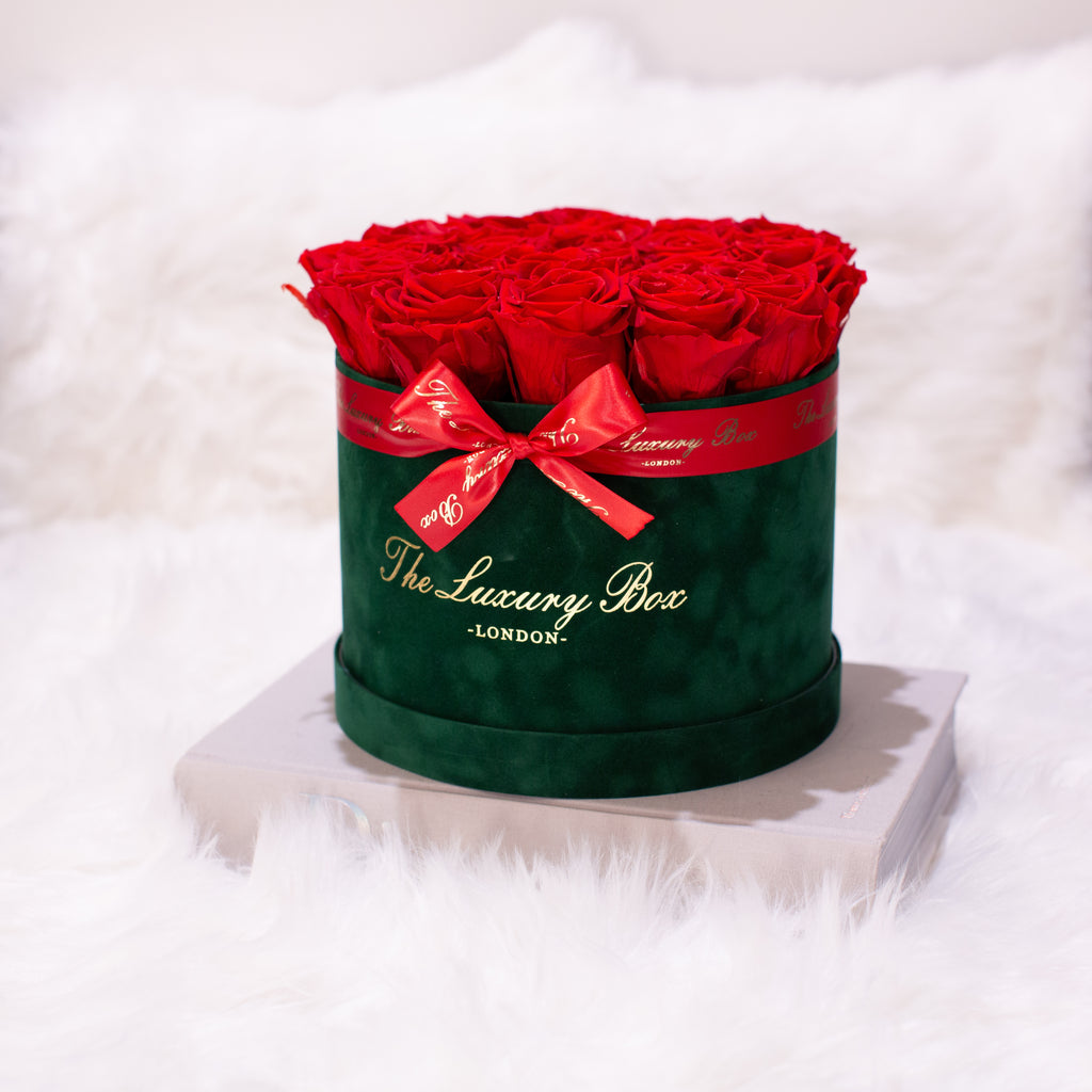 red infinity roses delivered in green box as gift for her birthday, anniversary, valentine's day