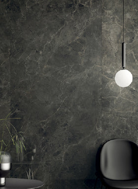 Black marble tiles on wall