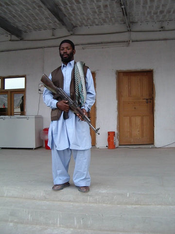 US Army Special Forces Green Beret in traditional Afghan Dress