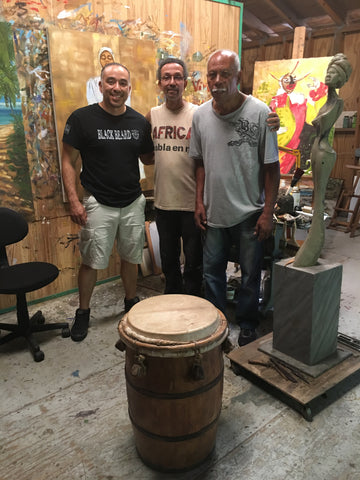 3 men standing inside an art studio in puerto rico