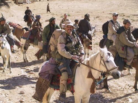 One of the soldiers in the first infiltration of Afghanistan in October 2001, Courtesy of https://www.military.com/video/operations-and-strategy/afghanistan-conflict/secret-mission-the-horse-soldiers-of-9-11/1224907912001