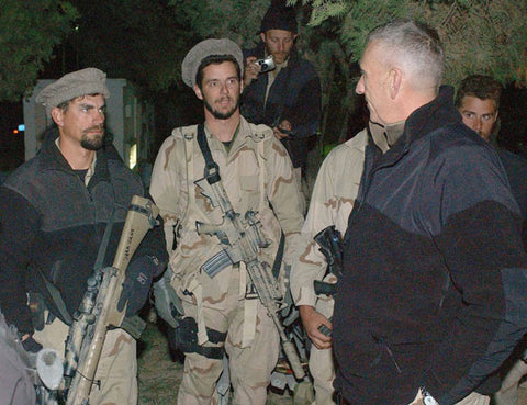 General Tommy Franks speaking with USSOF personnel in Afghanistan in late 2001, Courtesy of https://www.americanspecialops.com/photos/special-forces/special-forces-tommy-franks.php 