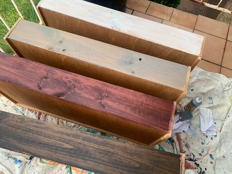 Stained backs of drawers for side by side comparison