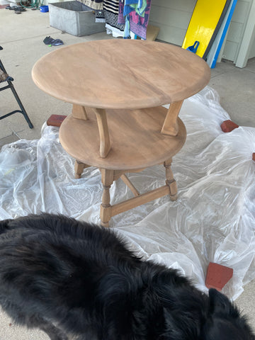 Table stained with brown paint wash