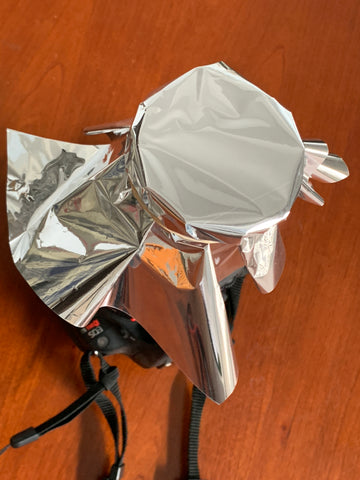 dSLR camera lens wrapped with Baader AstroSolar® Safety Film