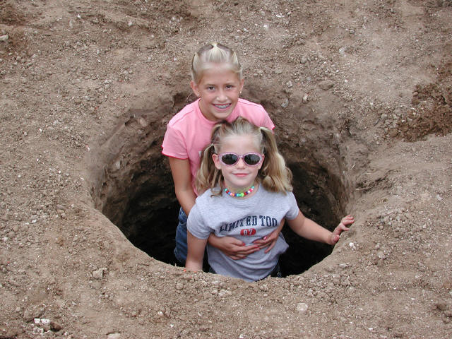 My daughters thought the pier hole was a fun place to play