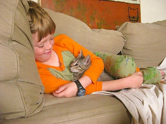 Katy Beh Jewelry with son and kitten