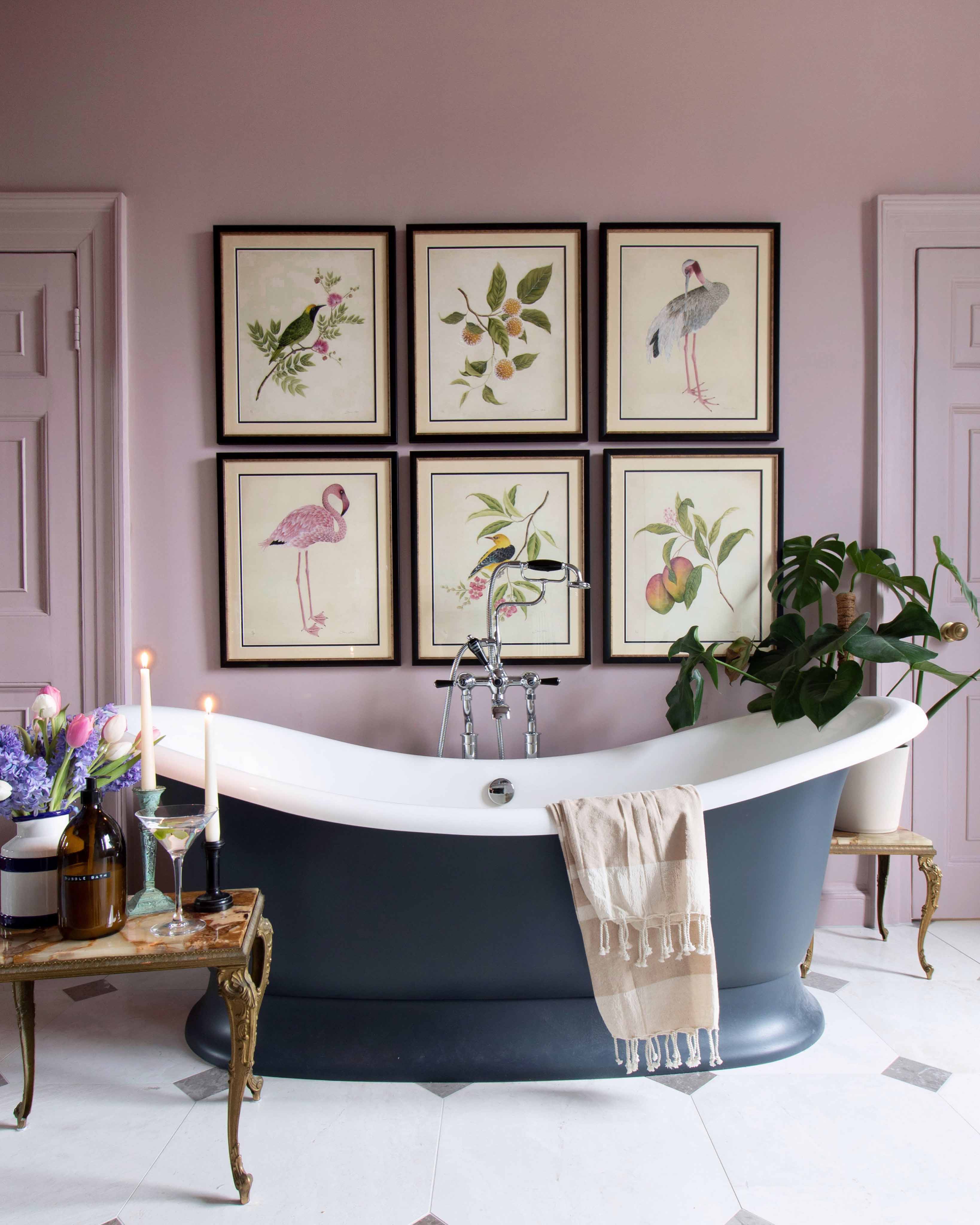 Set of six vintage botanical art prints in man with a hammer pink bathroom
