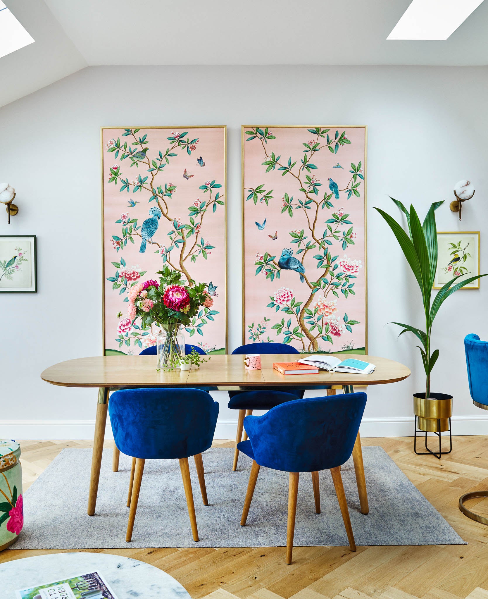pink floral framed chinoiserie wall panels in bright modern dining room
