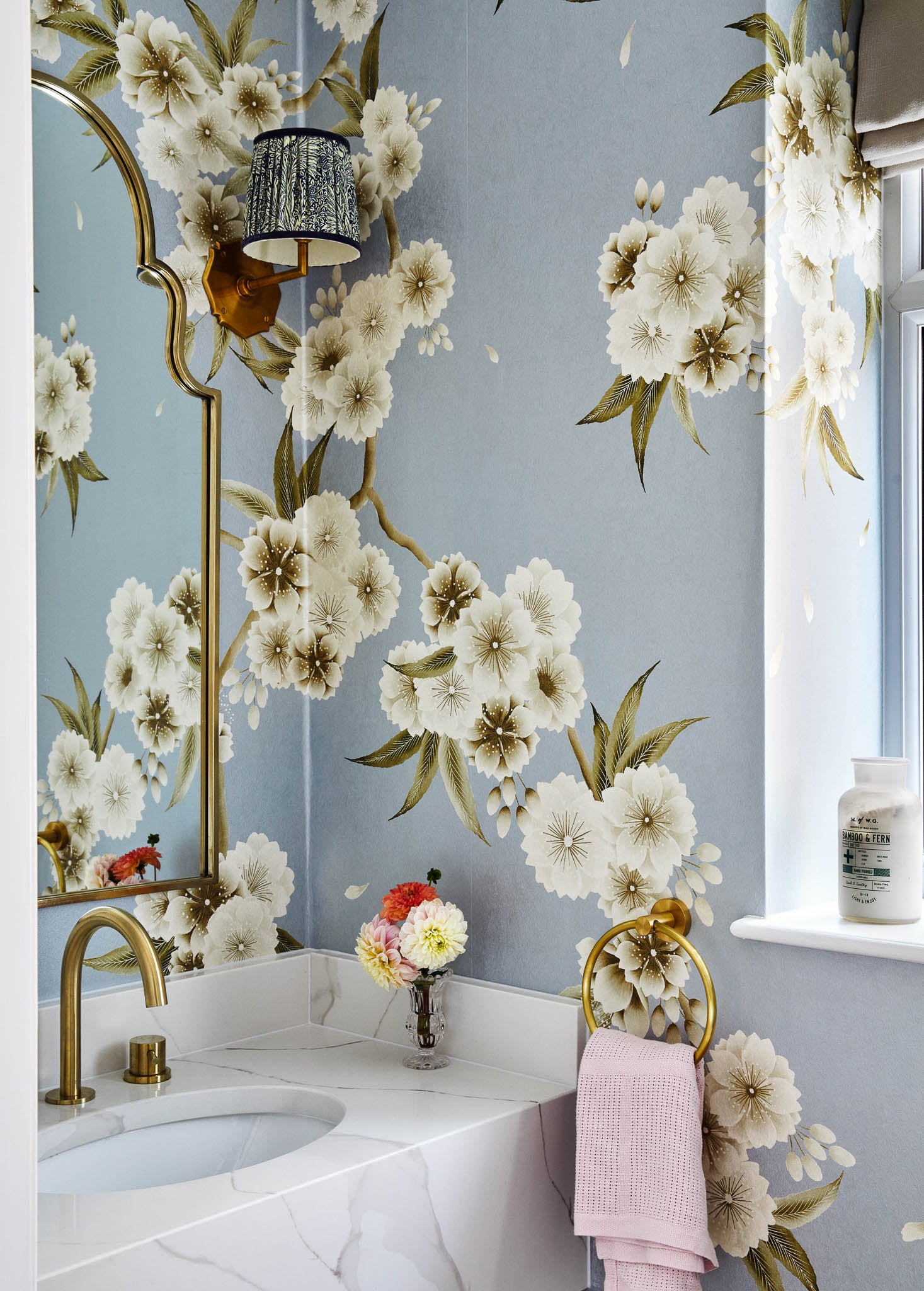 Floral chinoiserie wallpaper in modern luxury cloakroom