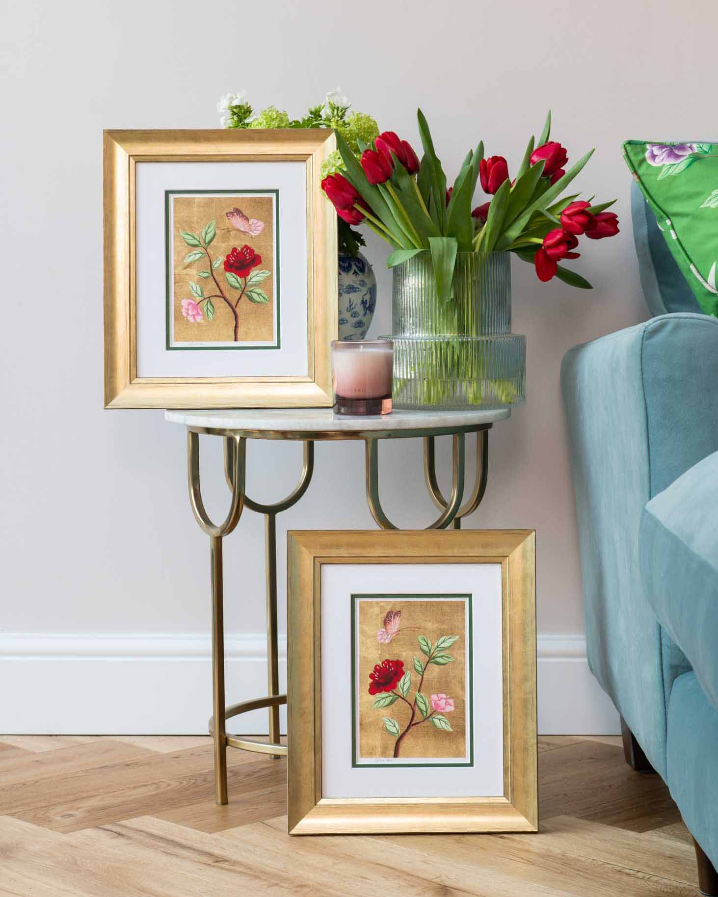 Gold framed set of two chinoiserie prints by diane hill in a lifestyle photo
