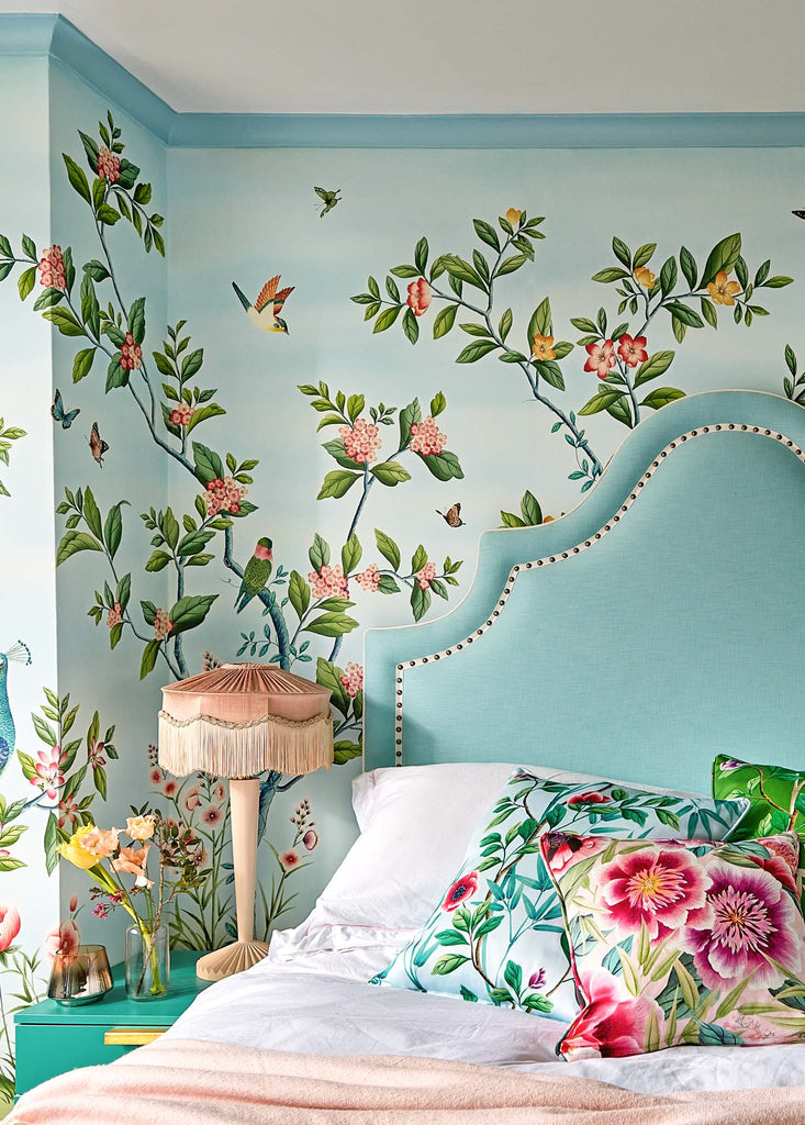 Florence Chinoiserie wallpaper Diane Hill bedroom sky blue blue headboard from the headboard workshop and pink lamp from beavamp