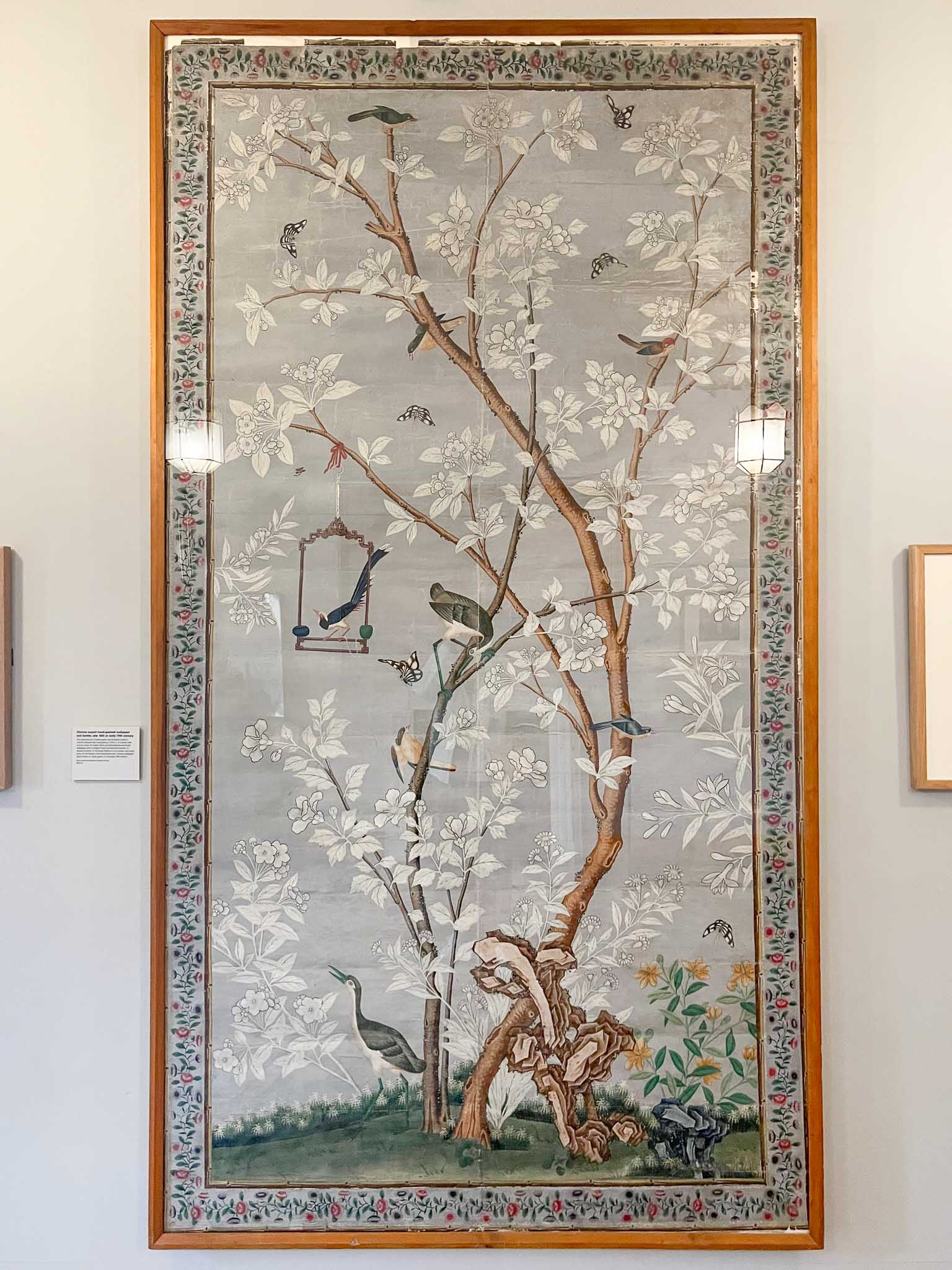 grey chinoiserie panel with white foliage