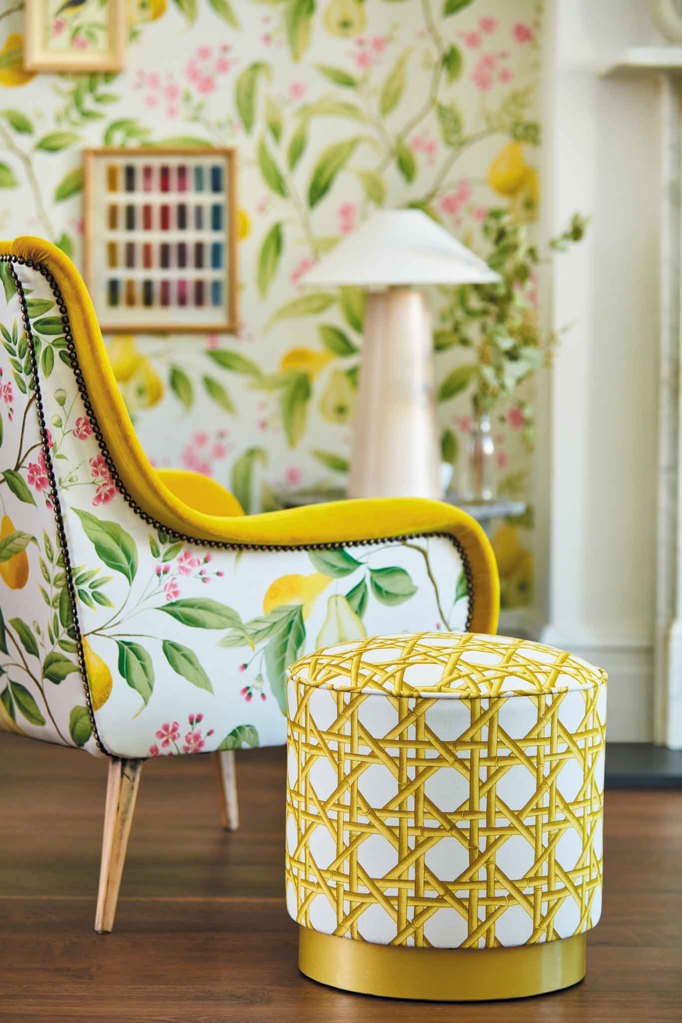 Lifestyle photograph of chinoiserie living room featuring 'Marie' and 'Lovelace' fabrics by Diane Hill and Harlequin on soft furnishings