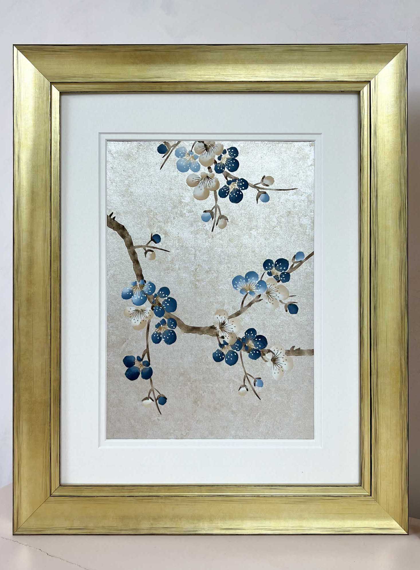 gold framed chinoiserie blossom flower painting by Diane Hill on a silver foil background with blue and white flowers
