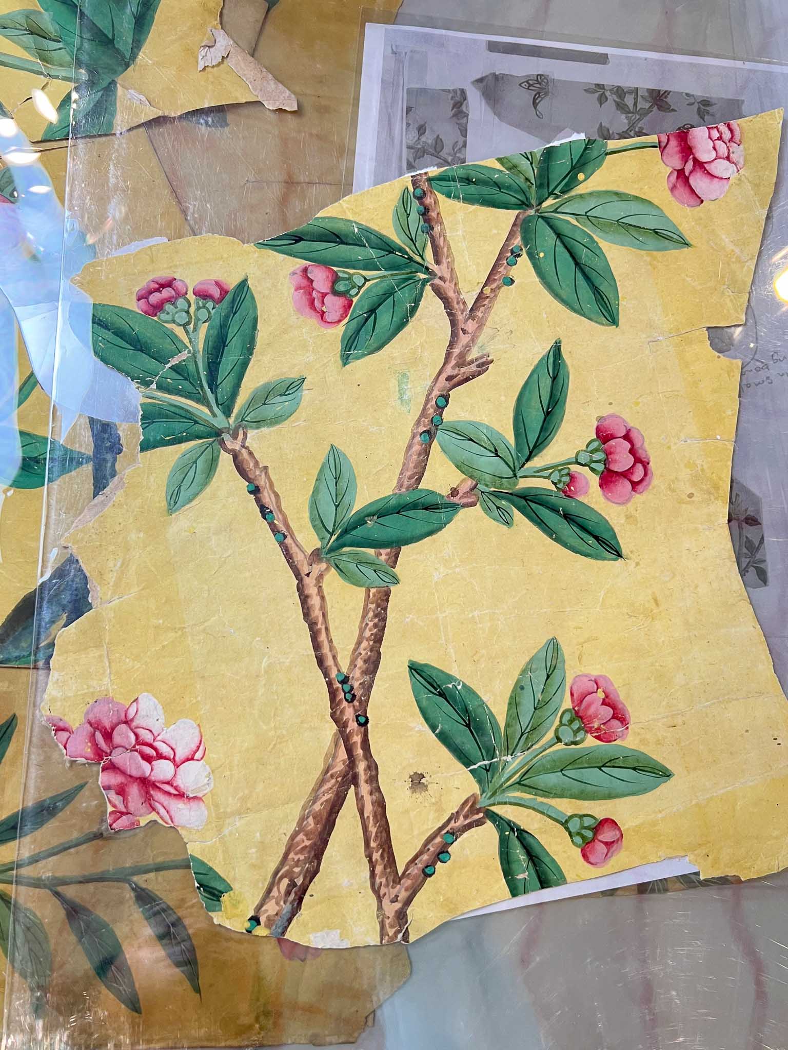 Cut out panel of yellow chinoiserie wallpaper