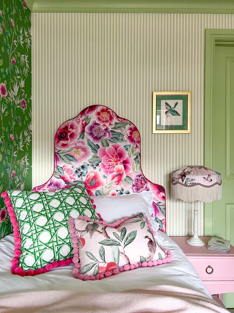 Jane clayton custom made headboard and cushions in harlequin floral green and pink fabric. Lampshade made by beavamp