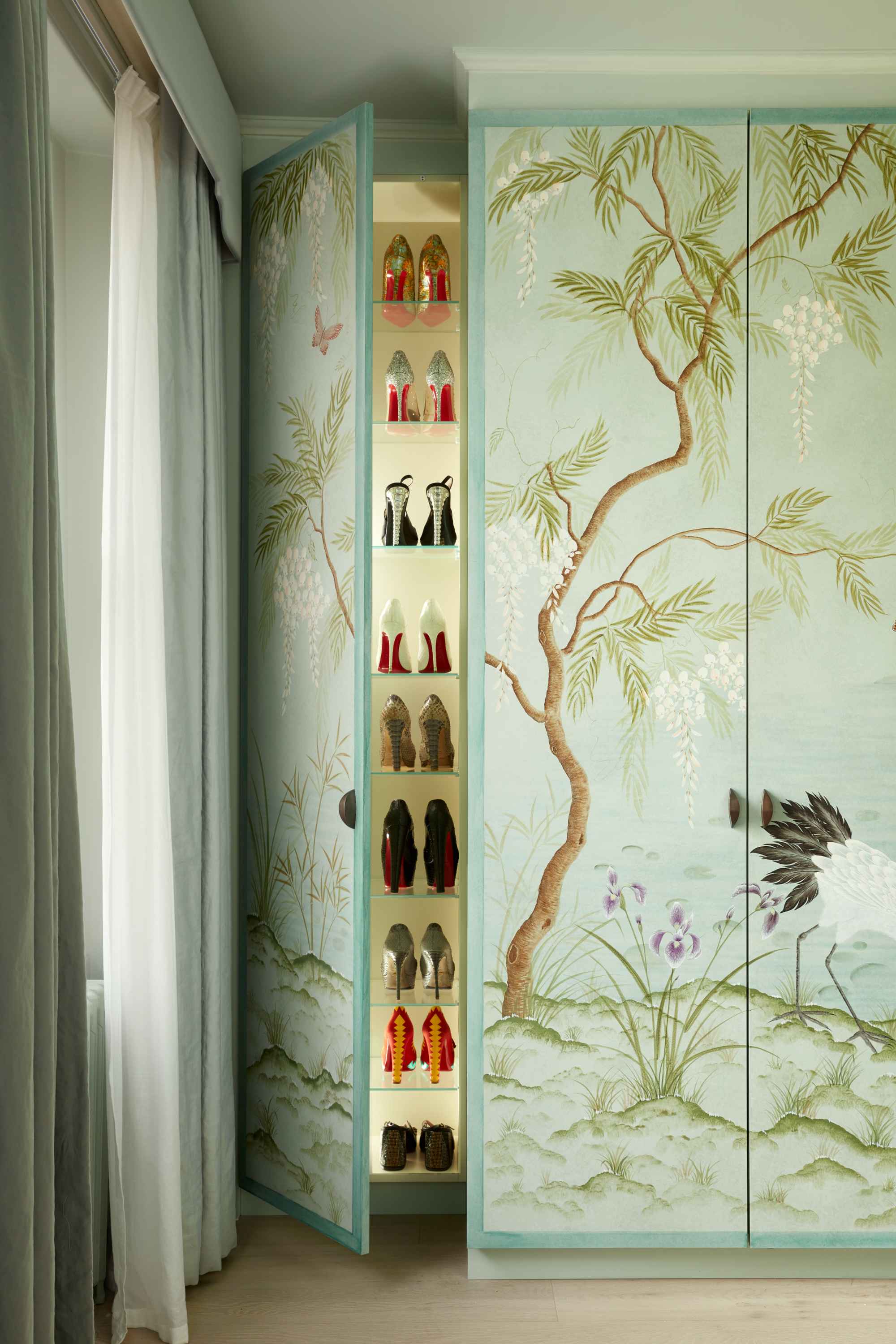 Shoes inside chinoiserie wardrobe painted by Diane Hill in Knightsbridge townhouse