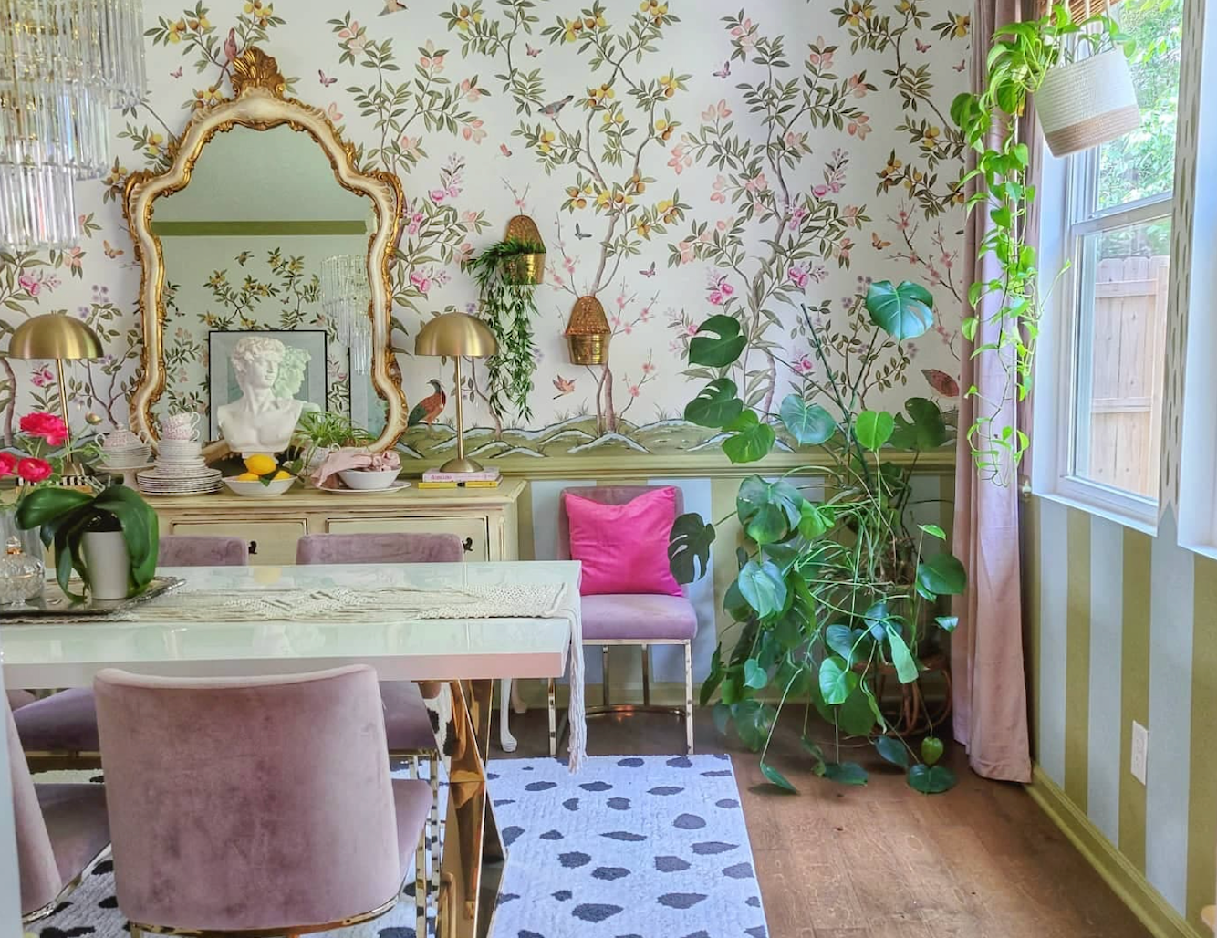 Maximalist dining room featuring Diane Hill's chinoiserie wallpaper design for Rebel Walls