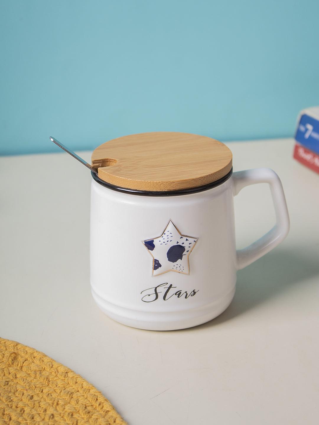 https://cdn.shopify.com/s/files/1/0267/1699/5754/files/star-ceramic-coffee-mug-with-lid-350-ml-stirring-spoon-mugs-1.jpg?v=1697015534&width=1080