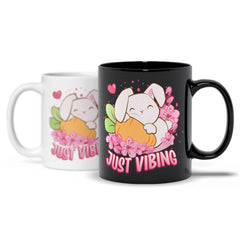 https://cdn.shopify.com/s/files/1/0267/2023/9639/products/Just-Vibing-Year-of-Rabbit-Kawaii-Coffee-Mug_medium.jpg?v=1673021785