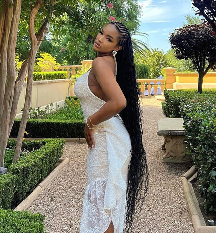 South African TV presenter, content creator and model, Ayanda Thabethe in half tribal braids. Image: https://www.instagram.com/ayandathabethe_/