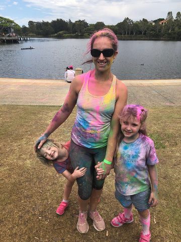 owlete active founder louisa with her two girls emily and asher at a colour fun