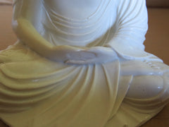 Buddha. Hands Touching = Relatation and meditation.