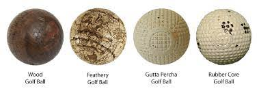 picture of old golf balls made from hardwoods