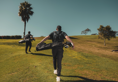 image of a guy walking with the Loma XL on the golf course