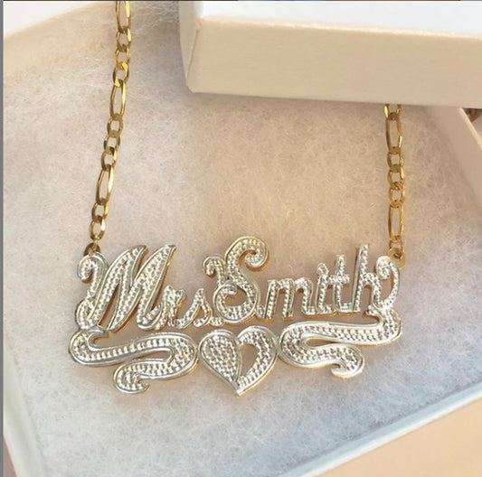 https://cdn.shopify.com/s/files/1/0267/2891/products/double-plated-name-necklace-Mrs-Smith.jpg?v=1623516331&width=533
