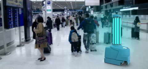 UVGI or UV light or UVC lamp in an airport around people sanitizing the airport