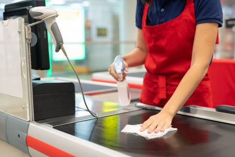 Cleaning a grocery store conveyer belt