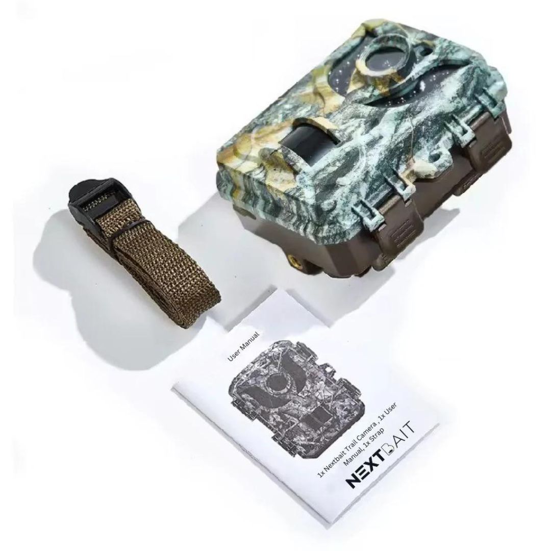 Compact and discreet, the outdoor expert mini trail camera with camouflage design is perfectly poised in natural surroundings, complete with a user-friendly manual by NEXTxTIAIT, ready to capture the hidden wonders of wildlife.