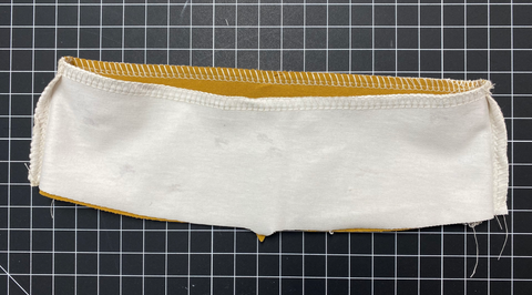 Sew waistband pieces right sides together at the top