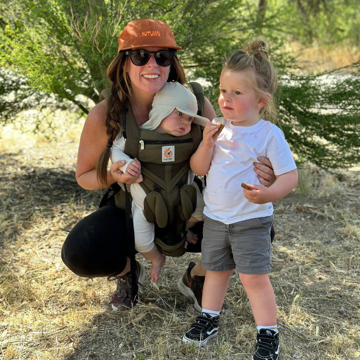 Lyndsey Bull pictured with her two children in a park