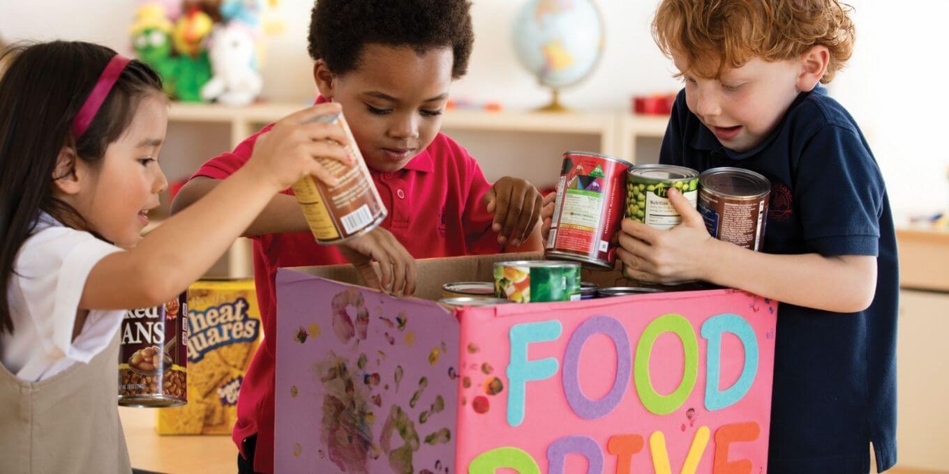 Children working together at a food drive