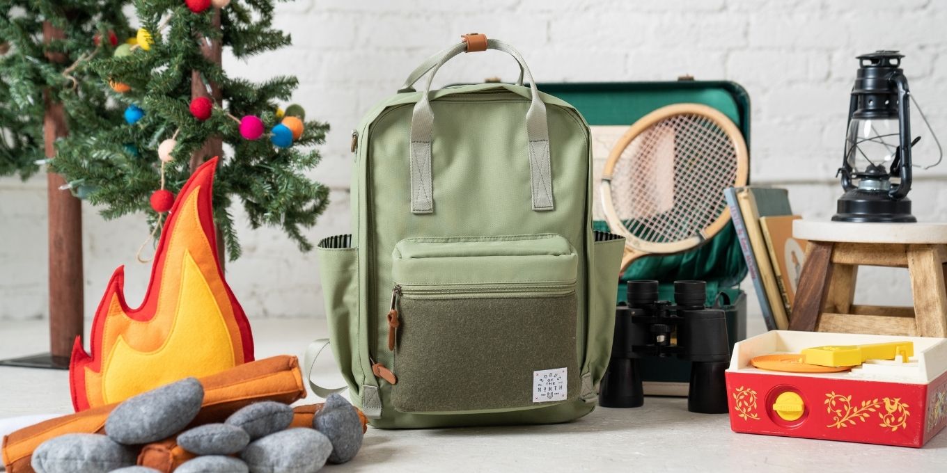 Image of Sage Sustainable Elkin Diaper Bag Backpack in Christmas scene