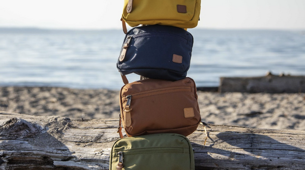 bags stacked on top of each other at the beach