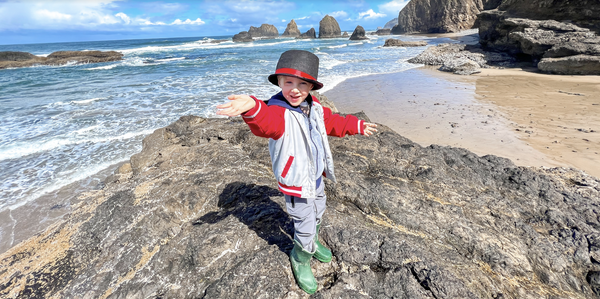 Kid smiling on the beach