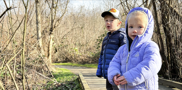 Kids on a trail outside