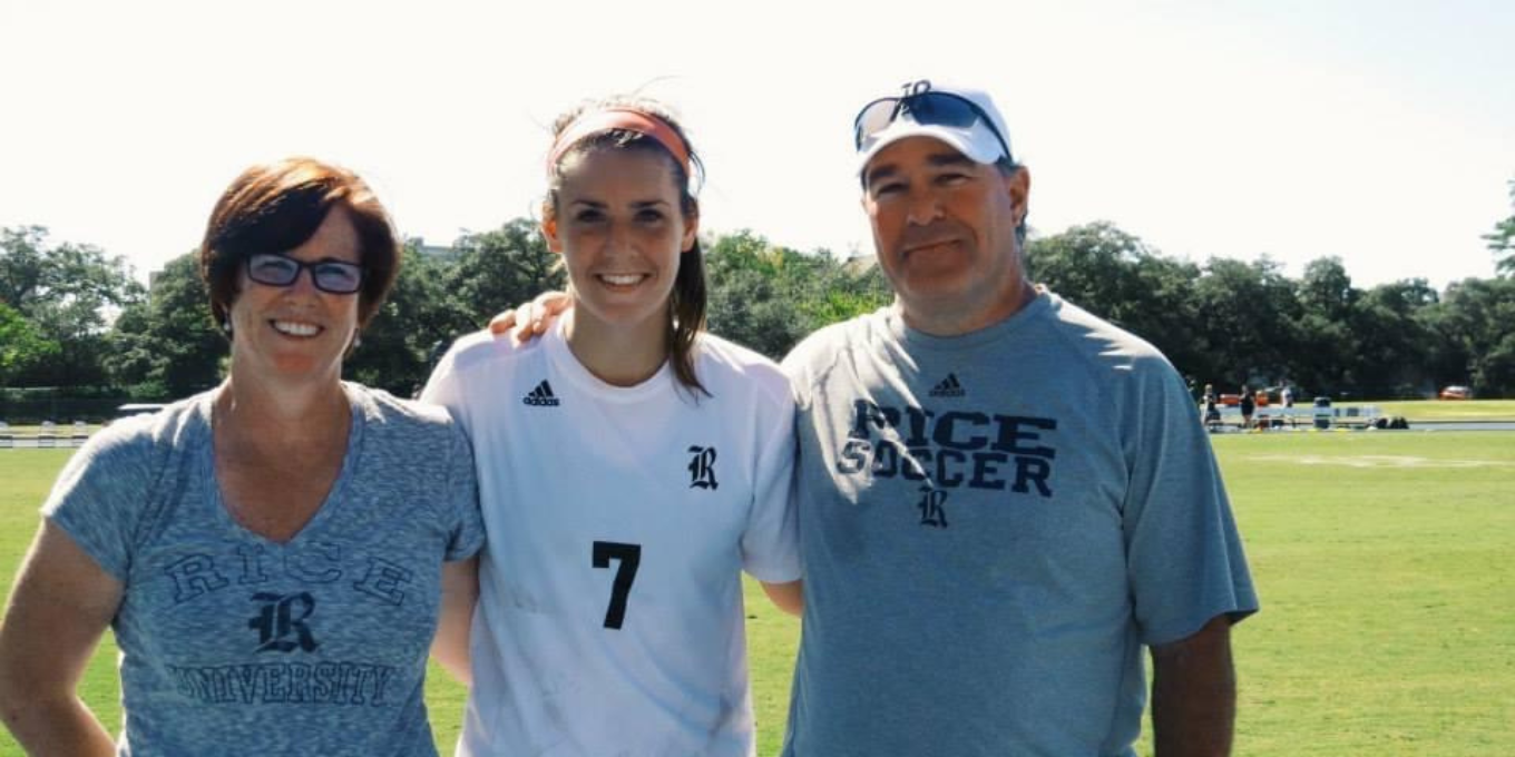 Lo Rivas with both of her parents at a soccer game