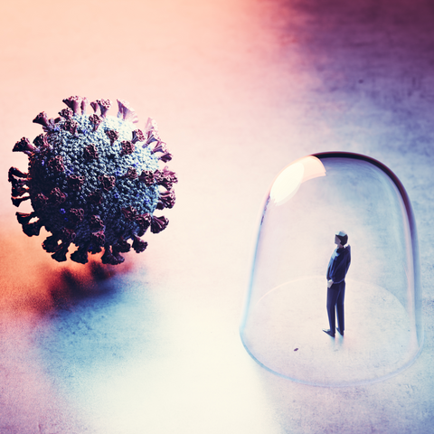 Image of a virus cell and a person with a shield around them.