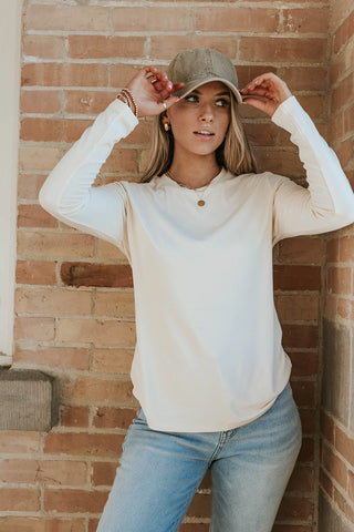 womens plain cream tee perfect to work as a base layer for fall outfits. www.loveoliveco.com